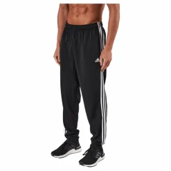 Essentials Warm-Up Tapered 3-Stripes Tracksuit Bottoms Black*adidas